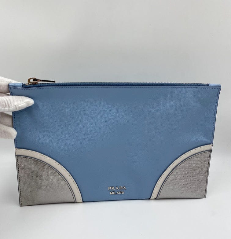 Leather clutch bag Prada Blue in Leather - 35536505
