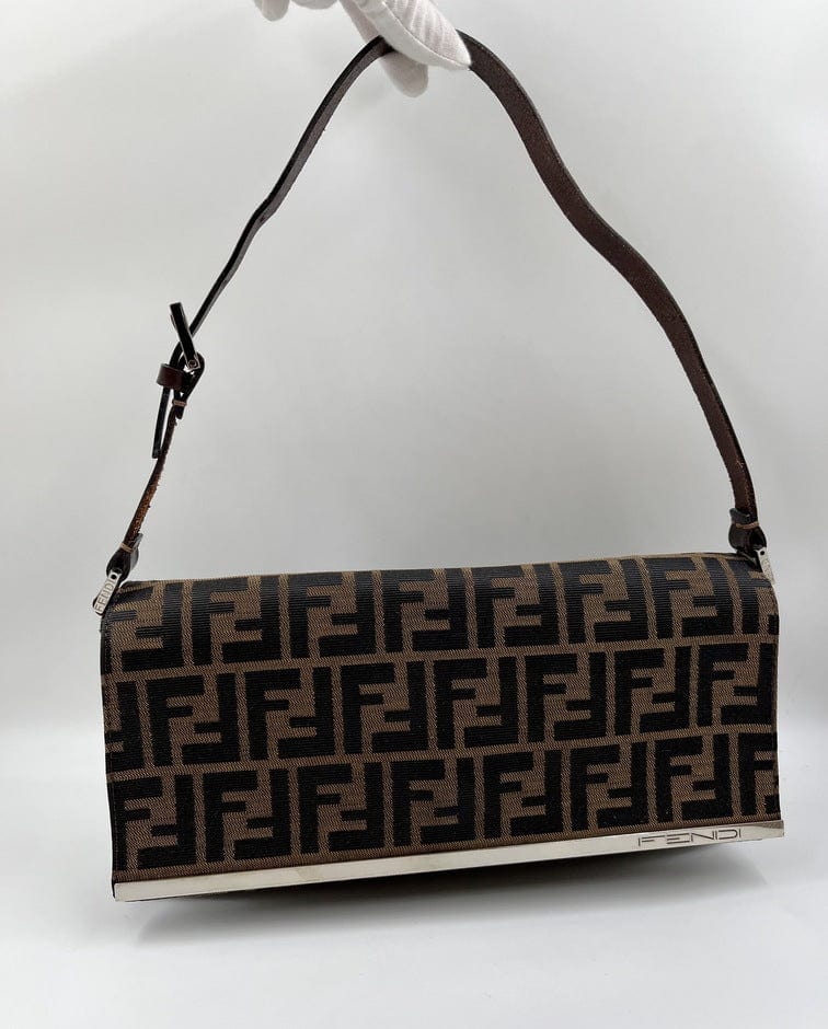 Vintage Fendi bag with the iconic Fendi pattern and whit…