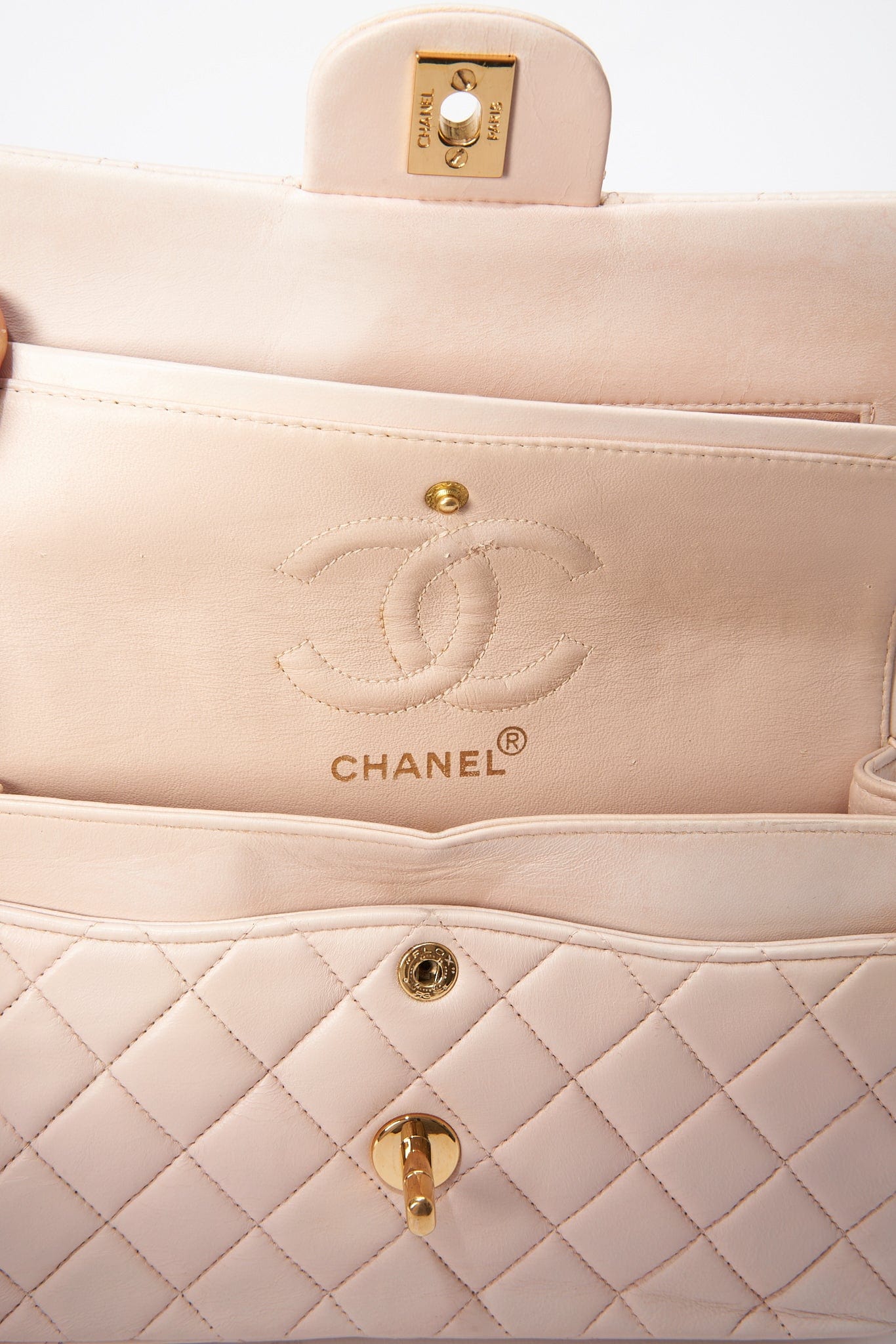 CHANEL CLASSIC FLAP BAG LIGHT PINK PYTHON with interwoven brass and  leather chain matching leather interior flap top with iconic CC turn lock  closure inside sticker 27086028 with box and dust bag