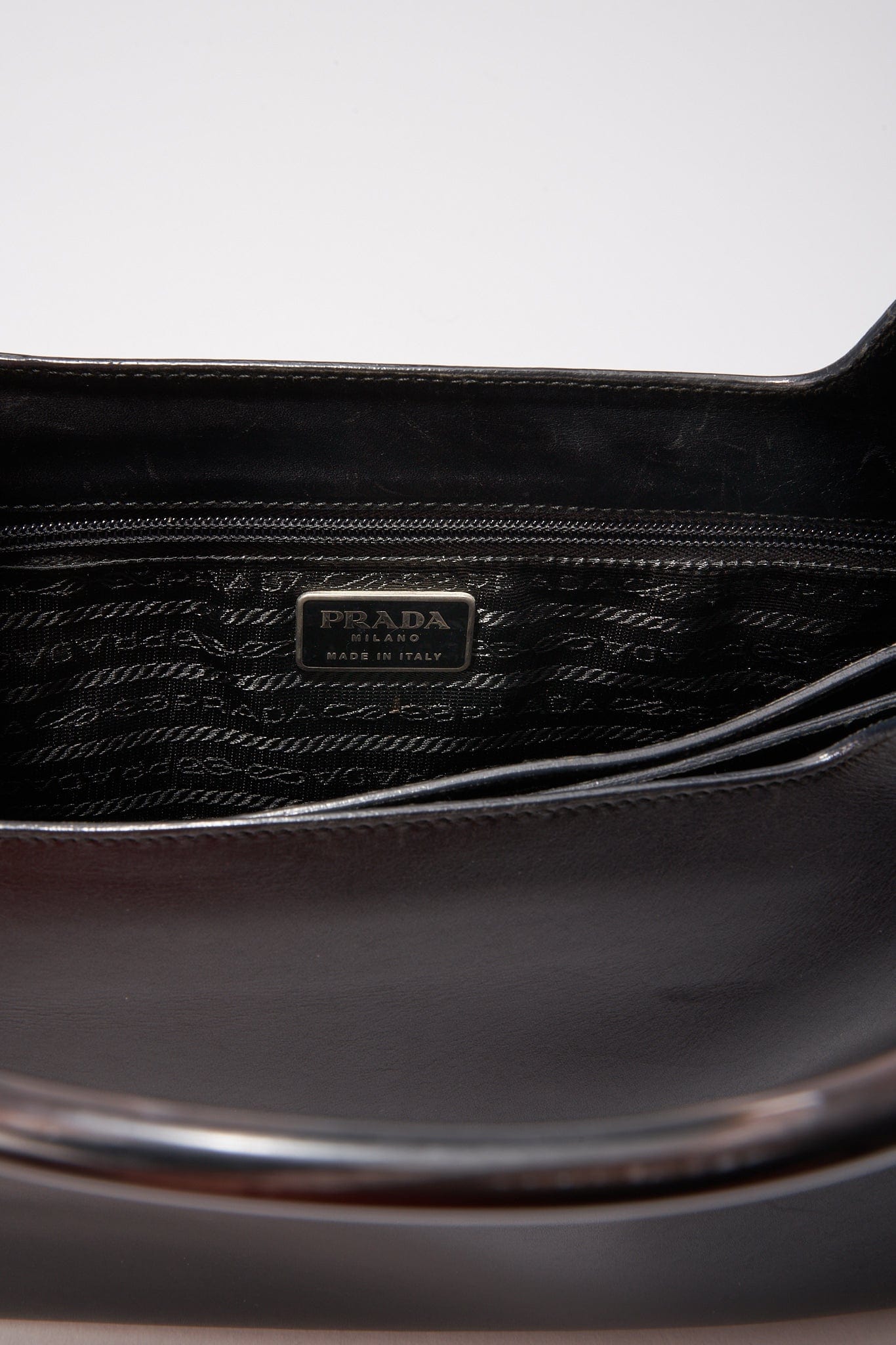 A vintage 90 s Prada Black Leather Shoulder Bag with Resin Handles