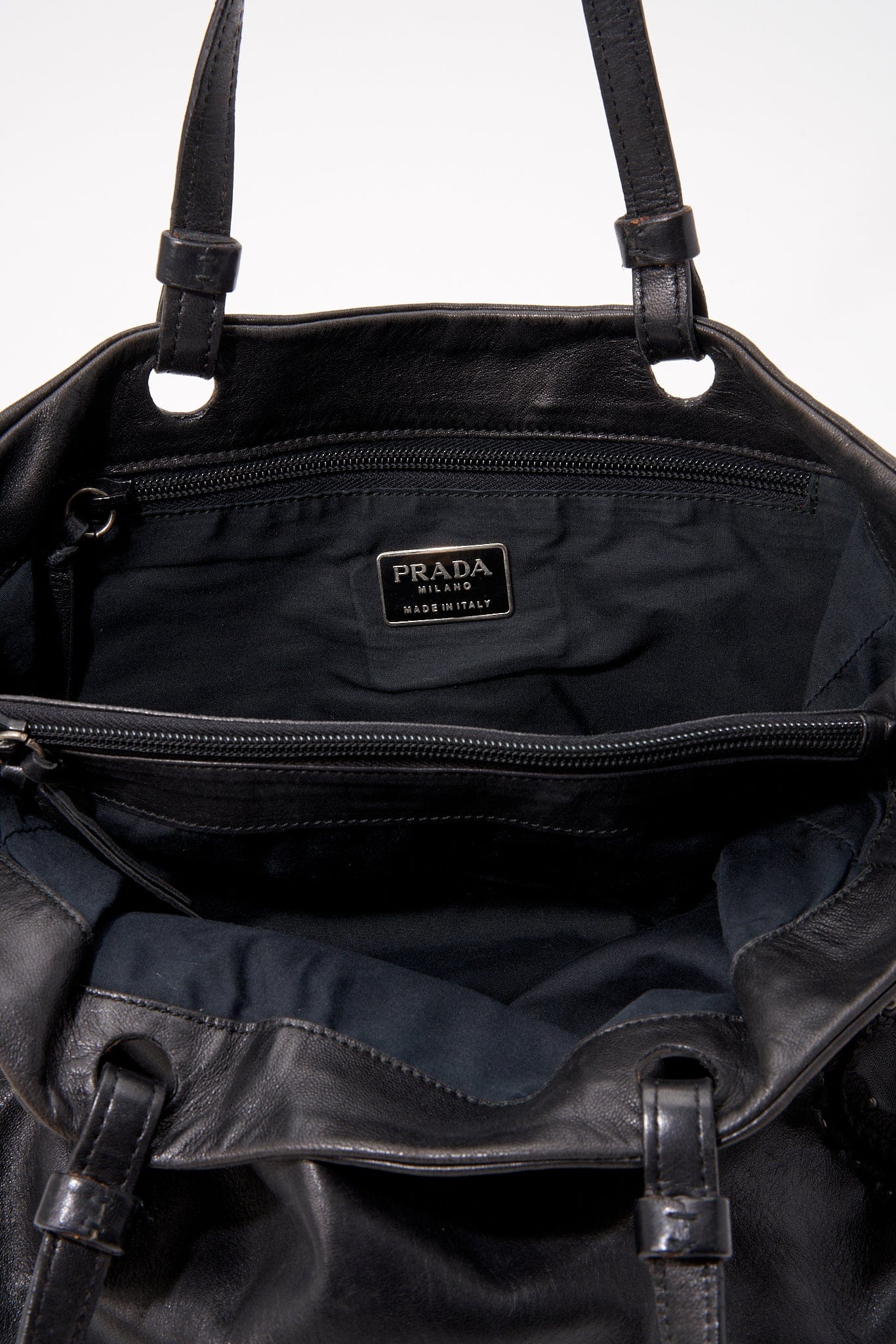 A vintage 90's Prada Black Leather Shoulder Bag with Stitch Detail