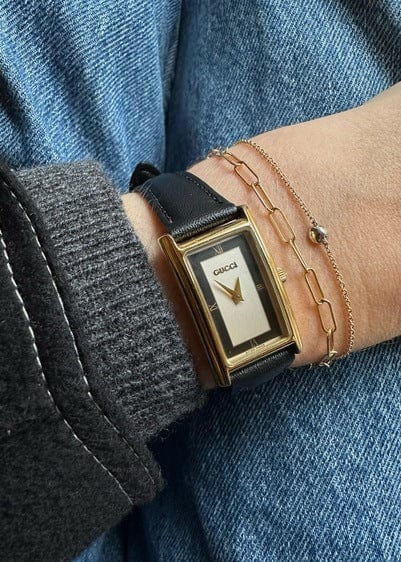 Vintage Gucci Gold Plated Watch with a Black Leather Strap