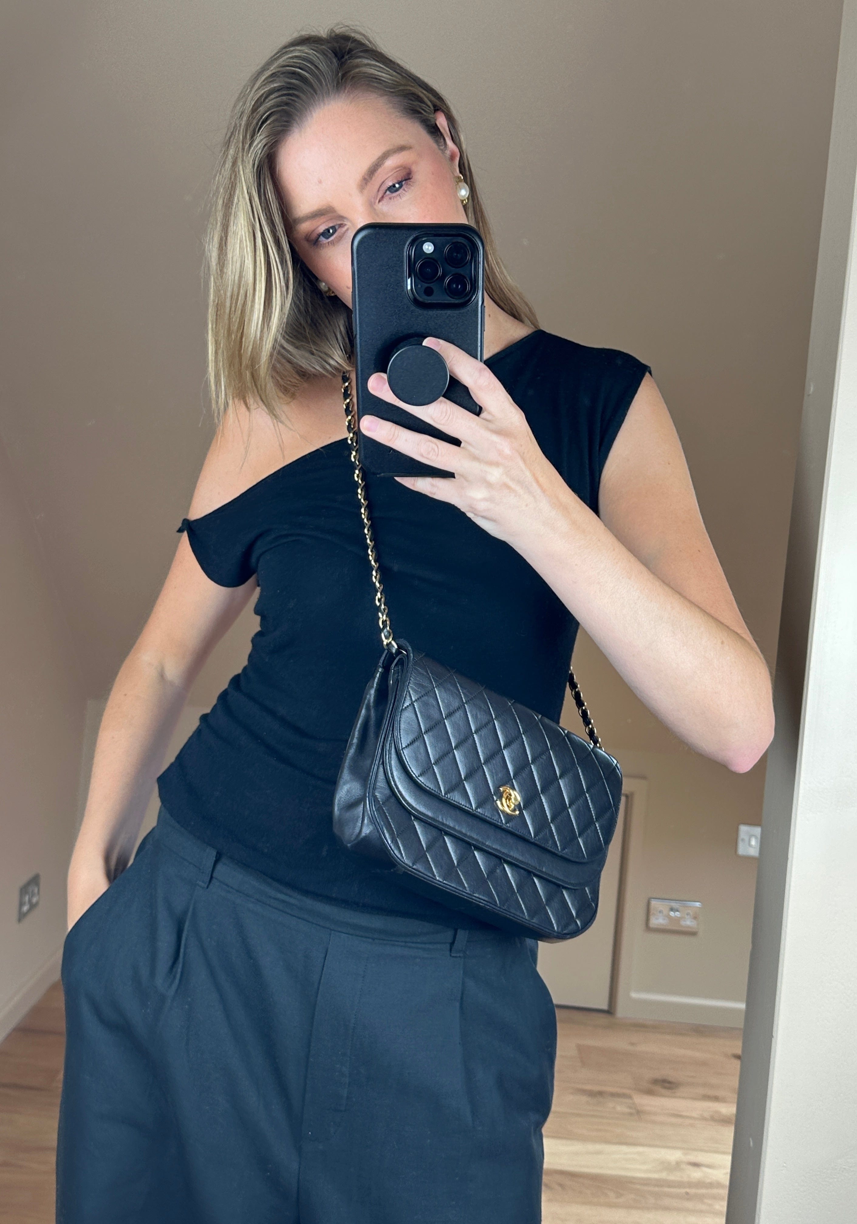 Chanel black quilted store crossbody bag